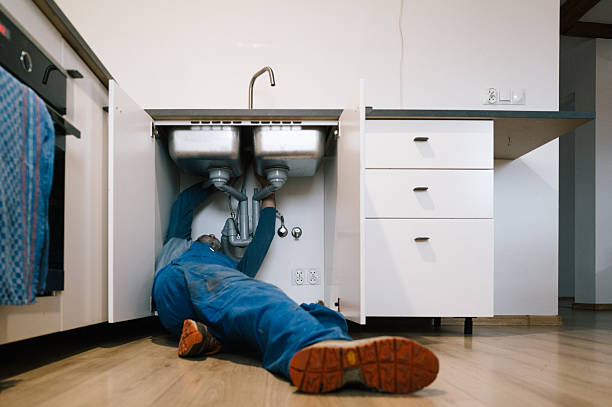 Professional Drain Cleaning technician working in Saybrook, IL